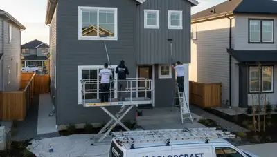 Professional siding painting on a historic home in Oak Park, IL by expert house painters